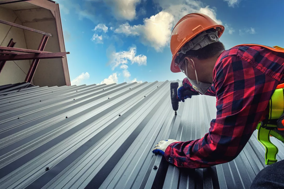 worker-man-building-tradesman-roof-house-with-safety-helmet