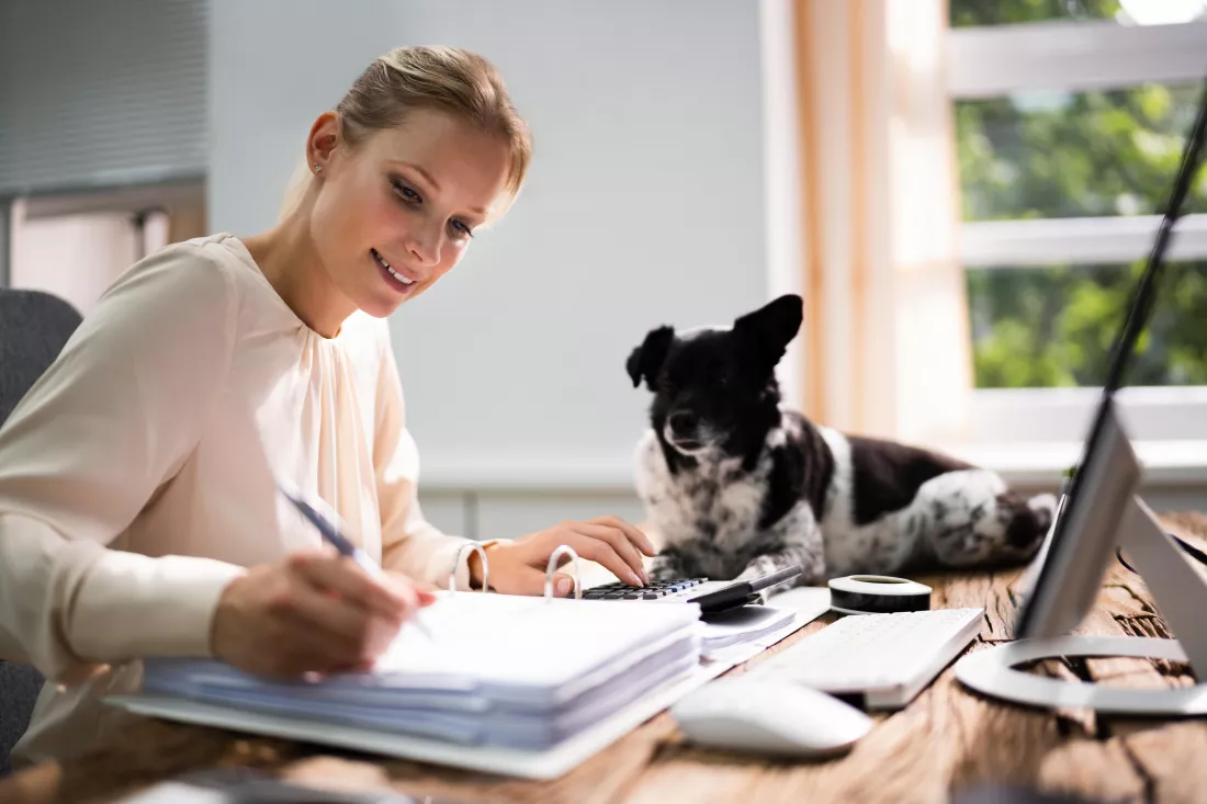 accountant-woman-doing-tax-accounting-using-calculator